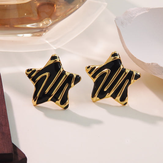 Aretes star negros