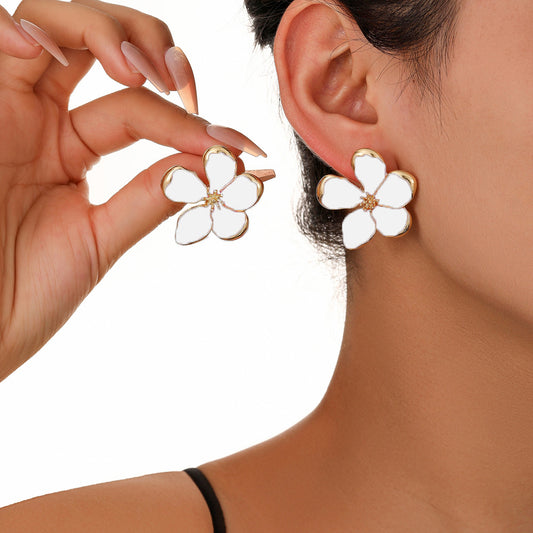 Aretes Hawái tono blanco